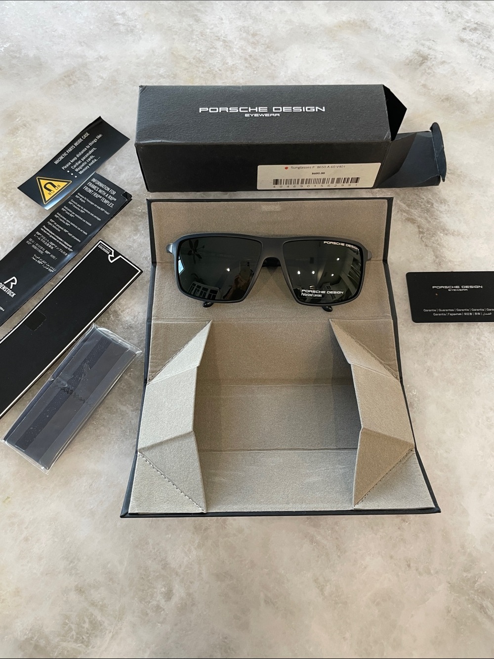 Womenโs Porsche Design Black Frame Sunglasses with Dark Lenses